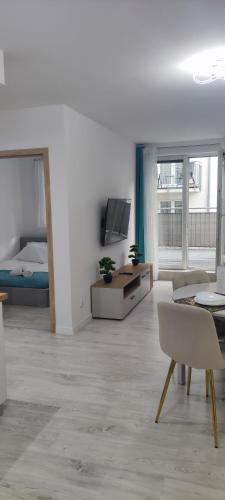 Postel nebo postele na pokoji v ubytování Kapi Royal Apartament