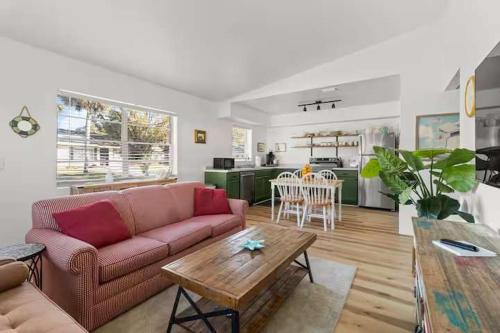 a living room with a couch and a table at Pet Friendly Crystal River Retreat for the Family in Crystal River
