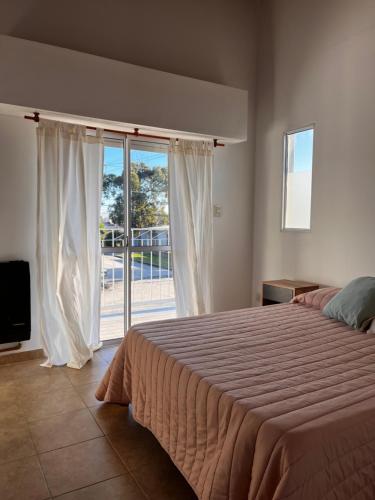 Postel nebo postele na pokoji v ubytování Costa duplex