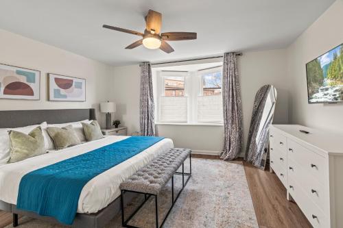 a bedroom with a bed and a ceiling fan at 3BR Gem in Graduate Hospital in Philadelphia