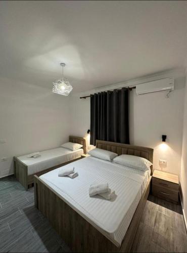Llit o llits en una habitació de Rus Rooms