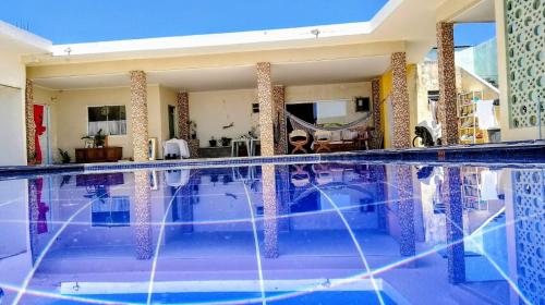 a large swimming pool in a house at Casa de Lazer e Eventos Monte Sião in Paulo Afonso