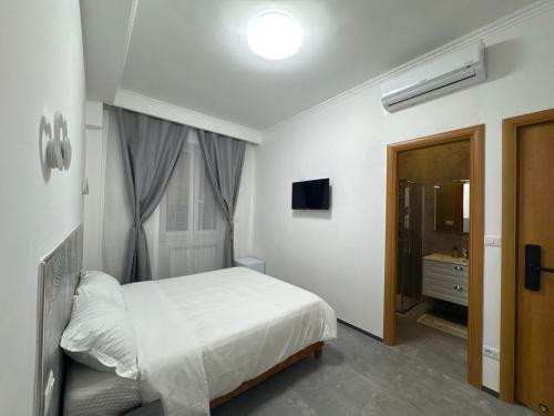 Ένα ή περισσότερα κρεβάτια σε δωμάτιο στο U Sweet Home