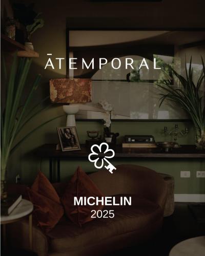 a sign that says attendor in a living room at Atemporal by Andean in Lima