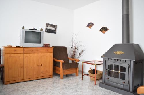 TV a/nebo společenská místnost v ubytování Chuca House