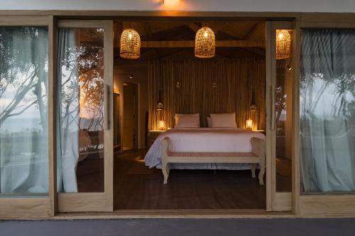 Een bed of bedden in een kamer bij Bela Vista Hotel Boutique