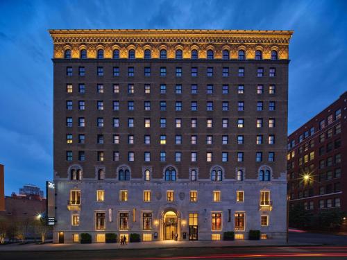 a large brick building with a large tower at 21c Museum Hotel St Louis in Saint Louis