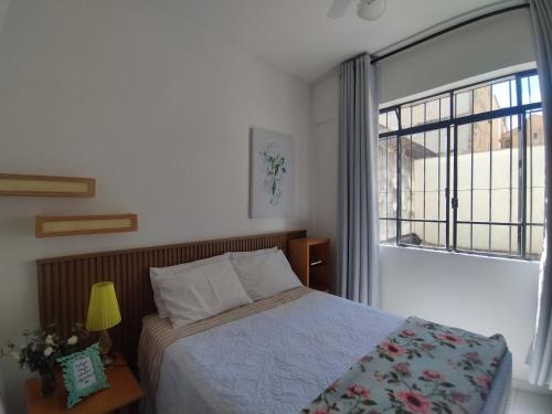 Postel nebo postele na pokoji v ubytování Home Carijós