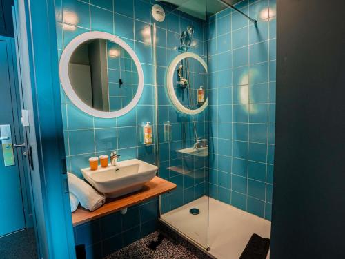 Phòng tắm tại Greet hôtel Montpellier Aéroport Parc des Expos