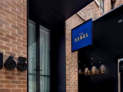a sign that reads the seel on the side of a building at The Sebel Sydney Martin Place in Sydney