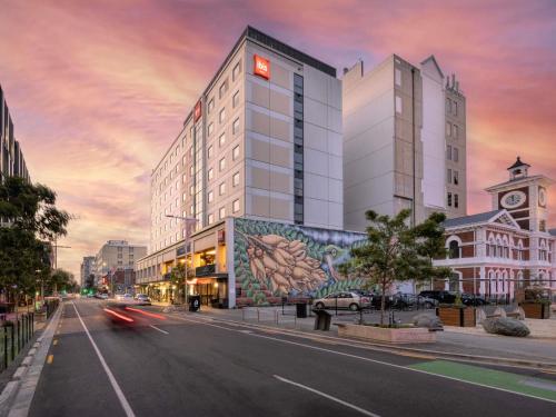 a rendering of a building on a city street at Ibis Christchurch in Christchurch