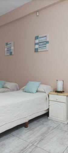 Ένα ή περισσότερα κρεβάτια σε δωμάτιο στο Departamento Romalu