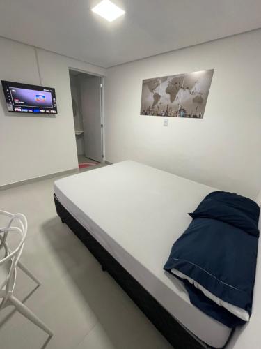 Postel nebo postele na pokoji v ubytování Studios Mattigor - ao lado da Dutra em Caçapava-SP