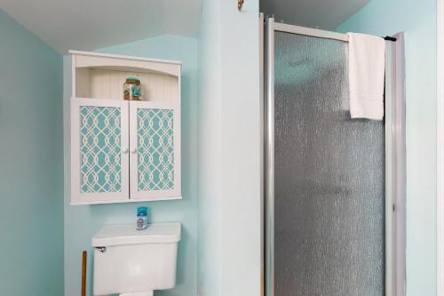 a bathroom with a toilet and a shower at Old Orchard Beach House - A in Old Orchard Beach