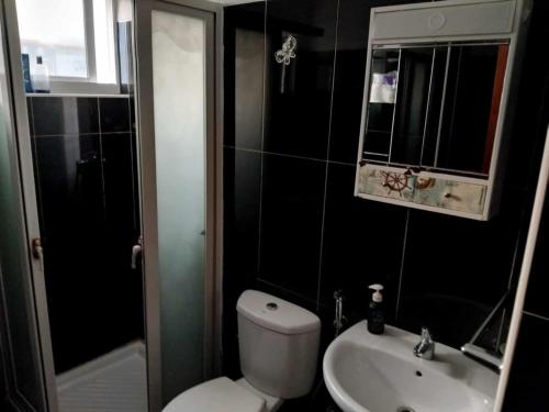 Koupelna v ubytování Gada House