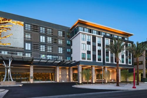 an exterior view of a building with palm trees at Element Las Vegas Symphony Park in Las Vegas