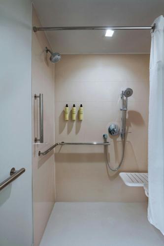 a bathroom with a shower with a shower curtain at Element by Marriott Las Vegas Symphony Park in Las Vegas