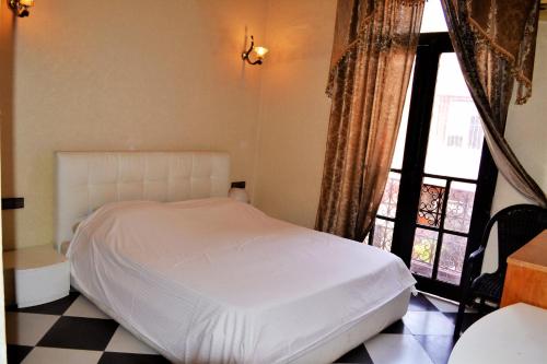 Et værelse på Le Grand Hotel Tazi