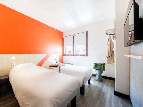 Giường trong phòng chung tại ibis budget Perpignan Centre Rénové en 2025 - Hôtel Economique au Centre ville de Perpignan