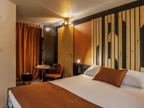 Кровать или кровати в номере ibis Styles Boulogne sur Mer Centre Cathédrale