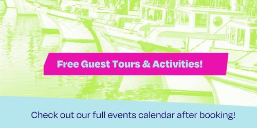 a pink banner with boats in the water at HI San Francisco Fisherman's Wharf Hostel in San Francisco