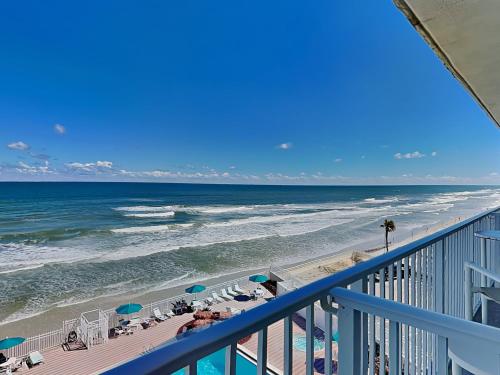 a view of the beach from a balcony at Harbour Beach Resort 503 in Daytona Beach