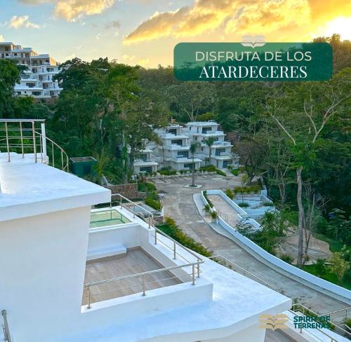 a view from the roof of a building with a street sign at apartamento exclusivo con jacuzzi, piscina y vista al lago in Las Terrenas