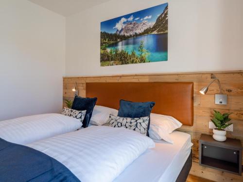 two beds sitting next to each other in a bedroom at Chalet Kolibri in Sankt Lambrecht