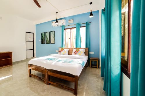 Postel nebo postele na pokoji v ubytování Hotel O Khan Basera