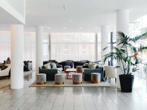 Khu vực ghế ngồi tại Mercure Brisbane Spring Hill