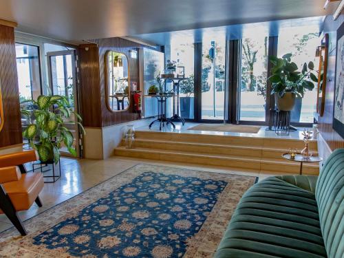 Posezení v ubytování MUZE Hotel Dusseldorf - Handwritten Collection