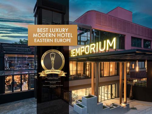 a sign for the best luxury modern hotel eastern europe at The Emporium Hotel Plovdiv - MGallery Collection in Plovdiv