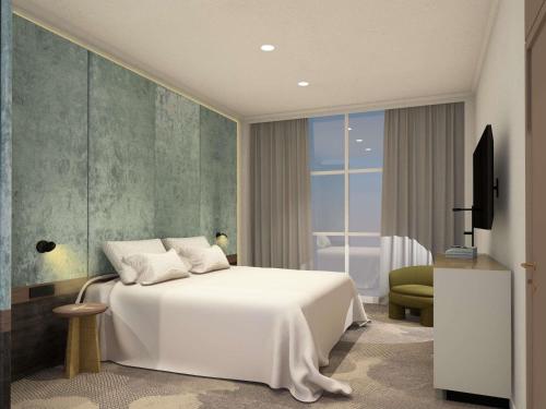 a bedroom with a white bed and a living room at Hotel Lycium Debrecen - Handwritten Collection (October 2025) in Debrecen