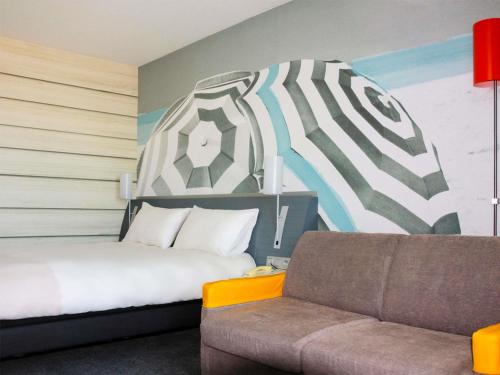 O zonă de relaxare la Ibis styles Toulon la Seyne sur Mer