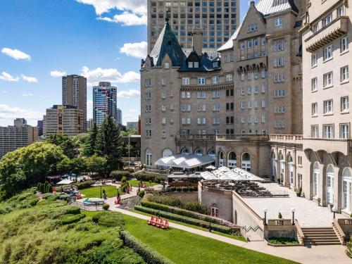 a view of a building with a park in front of it at Fairmont Hotel Macdonald in Edmonton