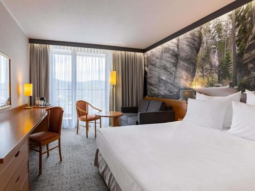Postel nebo postele na pokoji v ubytování Mercure Karpacz Skalny