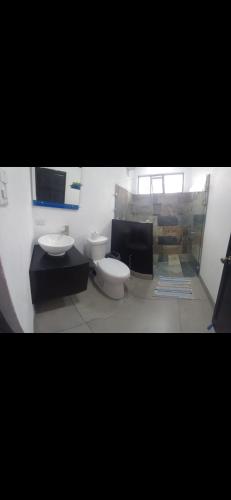 En eller flere senge i et værelse på Villa Coral Gables