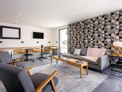 Televiisor ja/või meelelahutuskeskus majutusasutuses ibis Dijon Sud