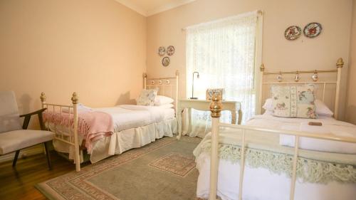 Ένα ή περισσότερα κρεβάτια σε δωμάτιο στο Harrietville Cottage