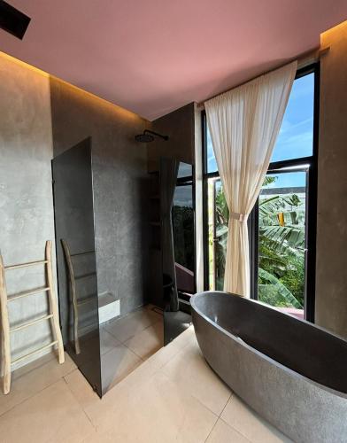 Ένα ή περισσότερα κρεβάτια σε δωμάτιο στο Tulum Villa Pandawa Melasti