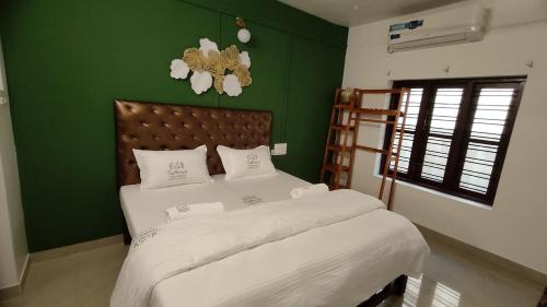 Ένα ή περισσότερα κρεβάτια σε δωμάτιο στο Trattorias Tranquil