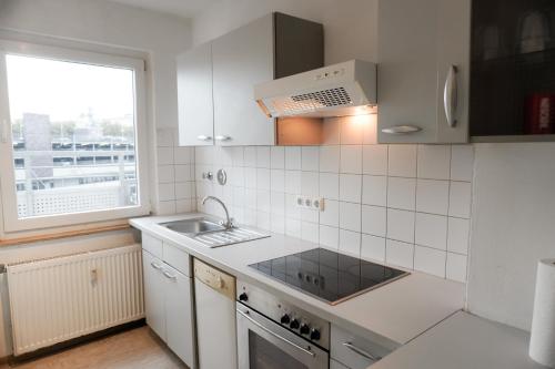 Kuchyň nebo kuchyňský kout v ubytování M House Do - Cozy Room - ideal für 1 Person