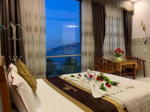Postel nebo postele na pokoji v ubytování Phương Anh 6 Hotel Đà Nẵng