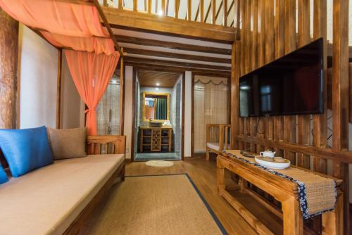 Et rom på Lijiang Yue Tu Inn