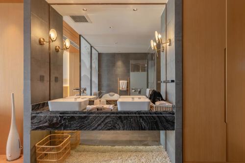 Fotografie z fotogalerie ubytování Cangyue Qionglou Lake View Holiday Hotel v destinaci Dali Shuanglang