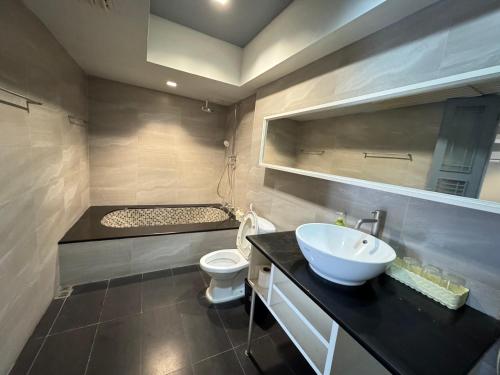 Phòng tắm tại Paragon Inn