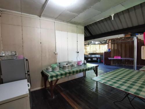 Kuchyň nebo kuchyňský kout v ubytování Tambatuon Homestead