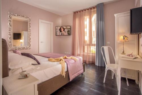 Cama o camas de una habitación en Rome Visits