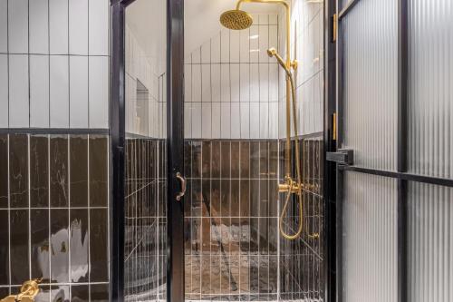a shower is shown through a glass door at Luxury Pool Villa Jomtien-1 Min to Beach in Jomtien Beach