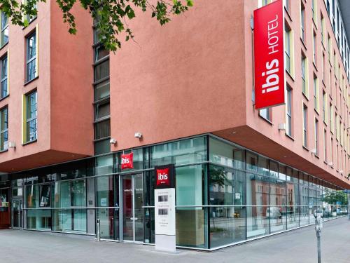 a building with a sign on the side of it at ibis Hotel Hamburg St. Pauli Messe in Hamburg